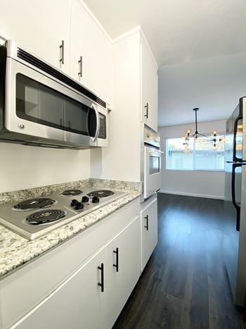 Kitchen with Stove Top and Microwave  at 2120 Valerga, in Belmont, California, 94002